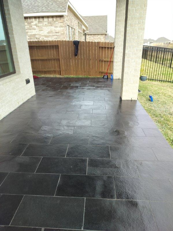 dark grey outdoor patio tile installation, wfa's custom hardwood floors, houston texas